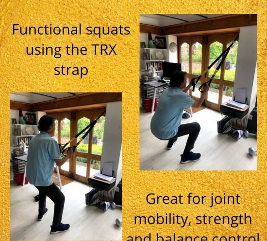 Functional squats using the TRX strap